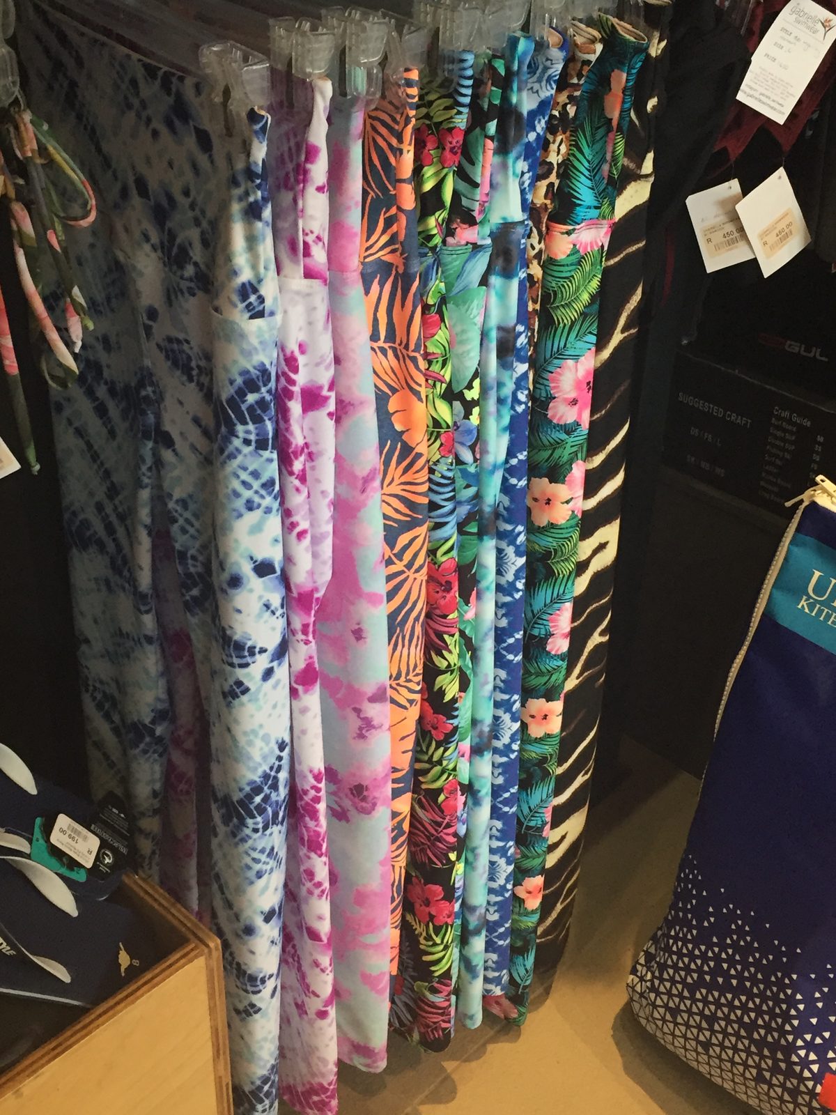 Rolls of vibrant printed swimwear fabric